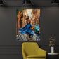Frau im blauen Kleid mit Vespa in sonniger Gasse Wandbild