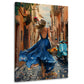 Frau im blauen Kleid mit Vespa in sonniger Gasse Wandbild
