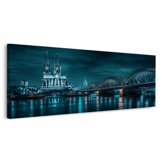 Panorama Wandbild Köln in kühlem Blau mit Dom und Rheinbrücke